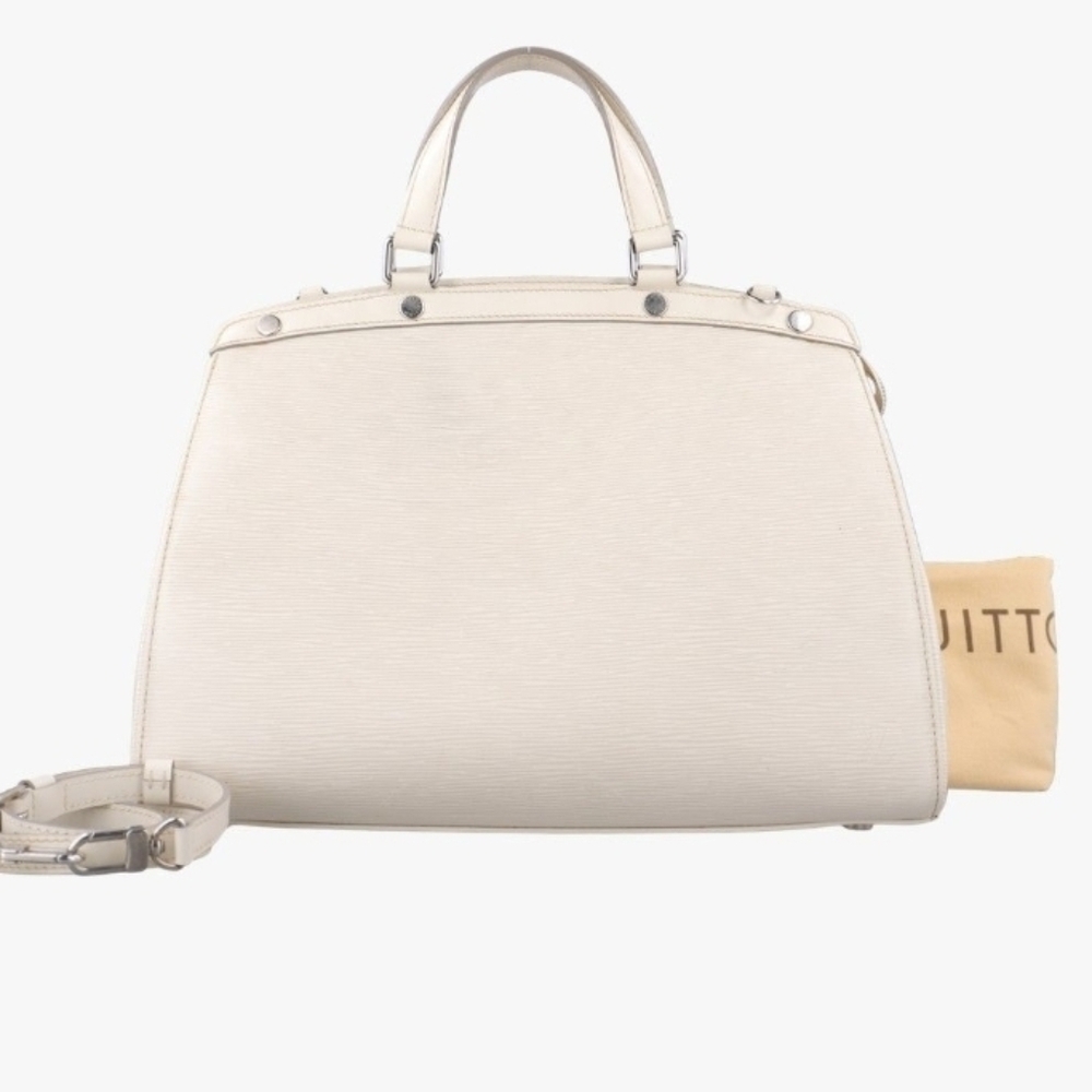 Louis Vuitton Epi Brea MM satchel in the color Ivorie (Ivory).